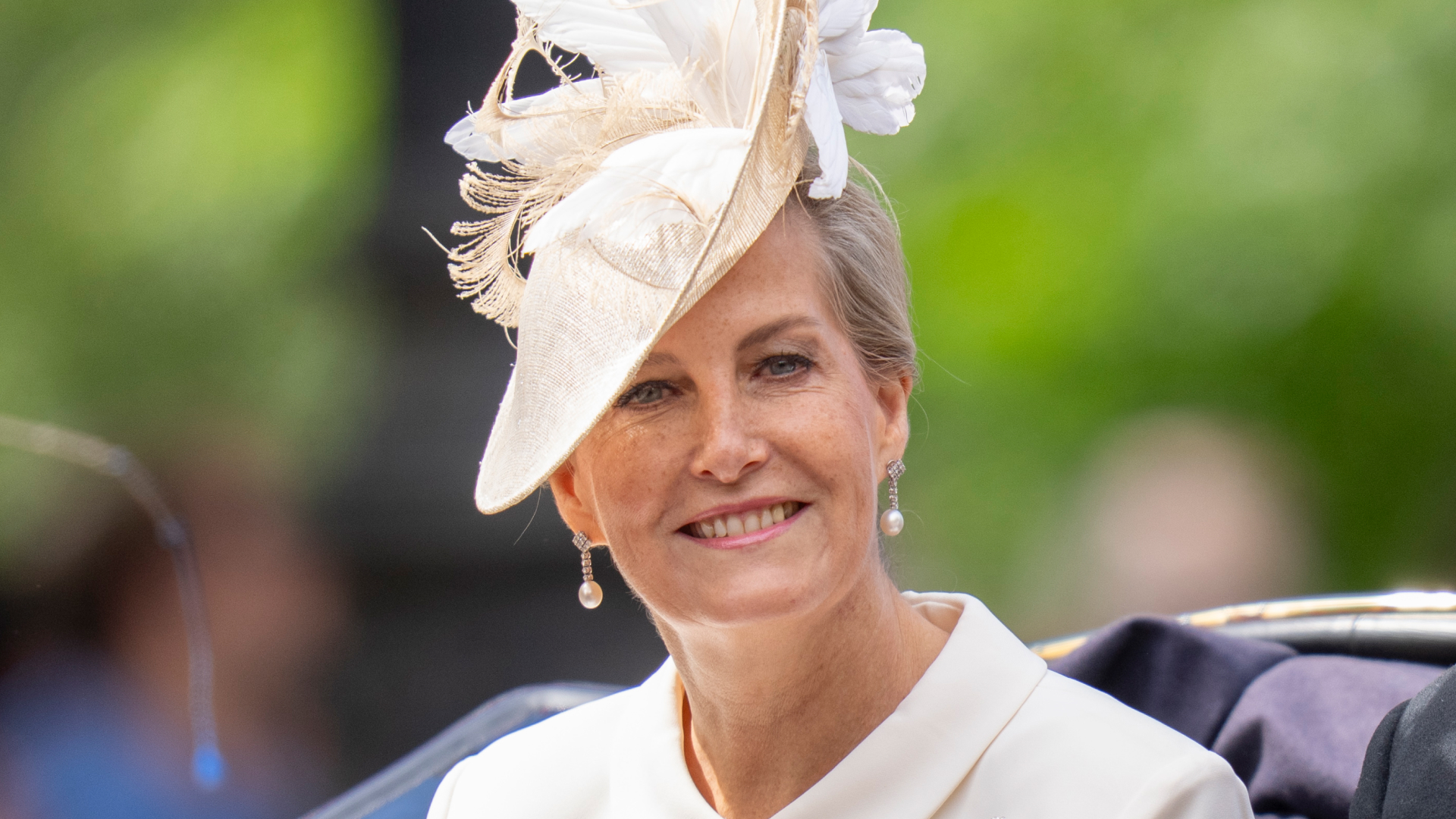 Duchess Sophie wears a cream white Roland Mouret dress, a designer loved by Princess Kate and Meghan Markle, with a matching hat
