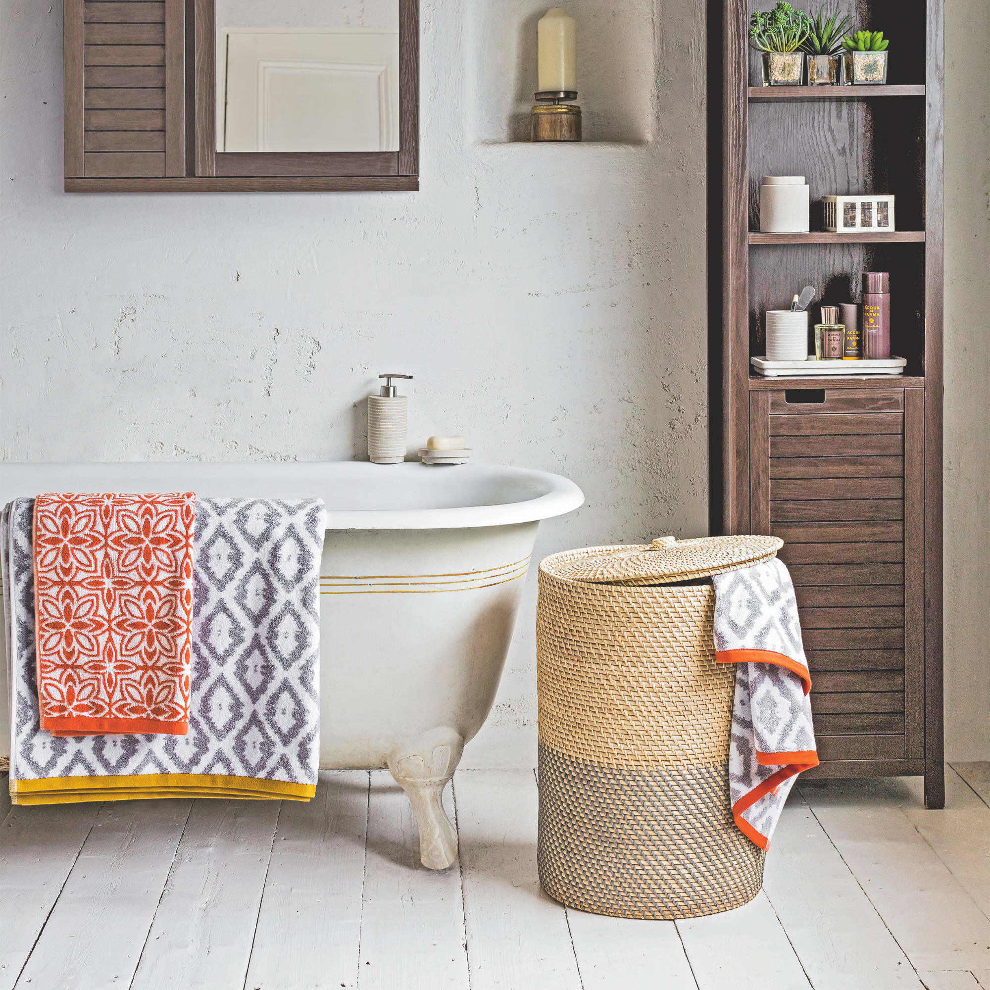 Woven laundry basket in bathroom