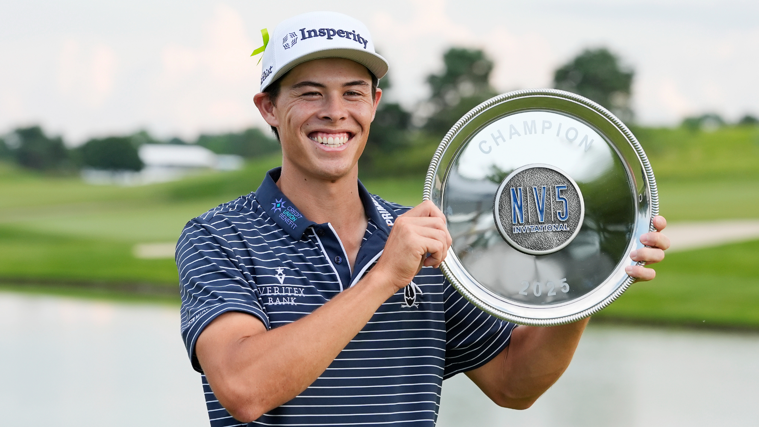 Johnny Keefer with the NV5 Invitational trophy