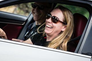 Inga Thompson behind the wheel of a VIP car at the 2019 Amgen Tour of California