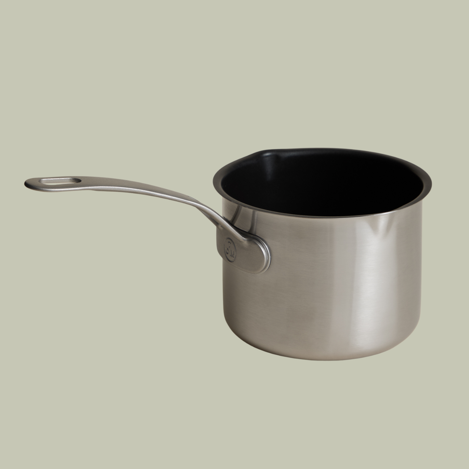 A steel milk pan