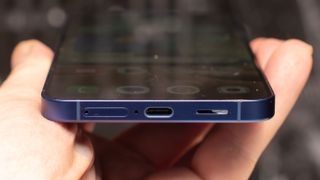 Samsung Galaxy S25 Plus in Navy Blue showing USB-C port on bottom