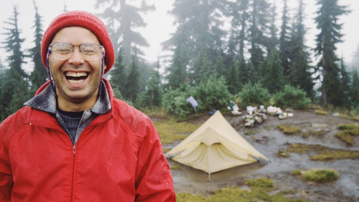 how to pitch a tent in the rain: soaked camper