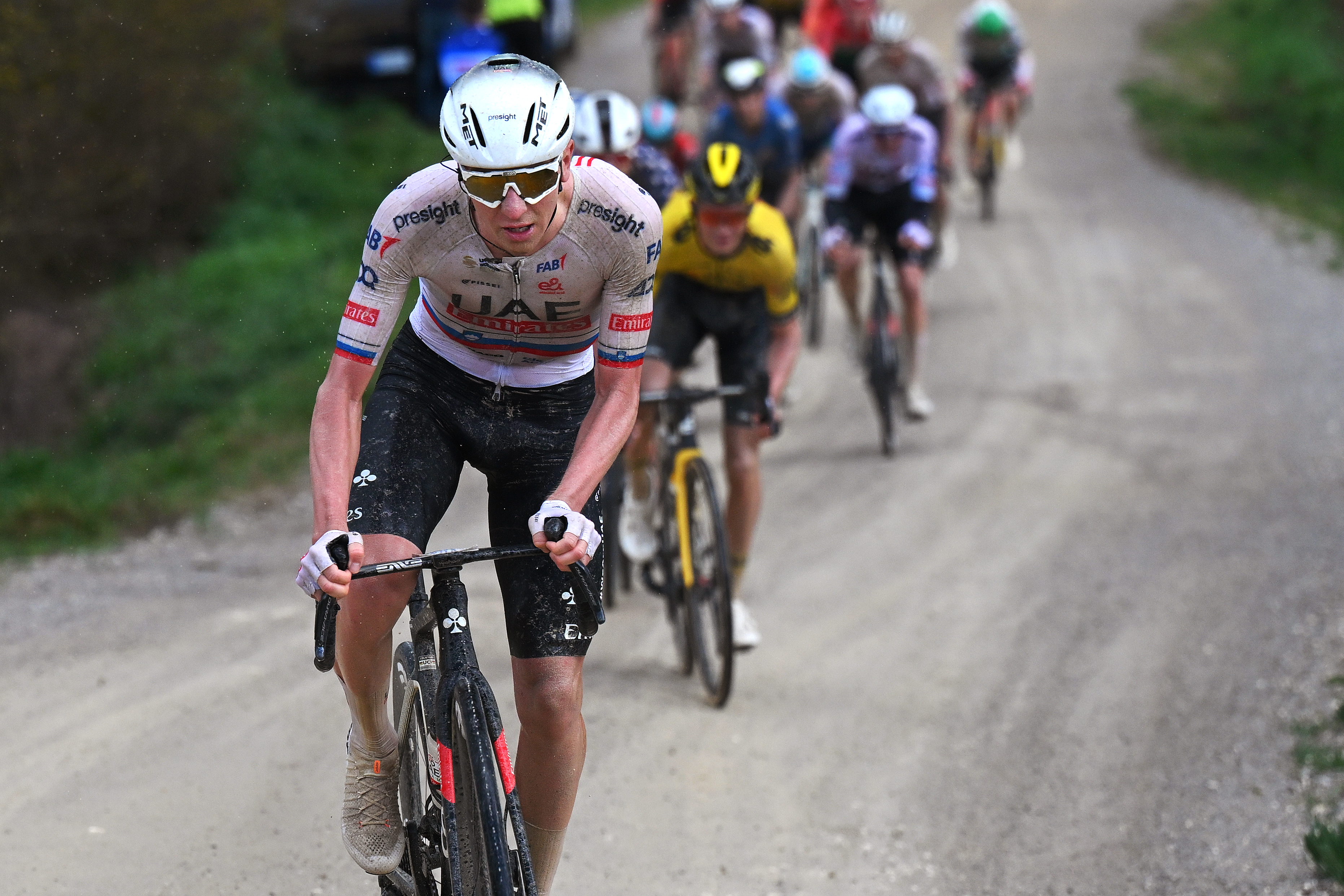 SIENA, ITALY - MARCH 02: Tadej Pogacar of Slovenia and UAE Team Emirates attacks in the breakaway during the 18th Strade Bianche 2024, Men&amp;amp;apos;s Elite a 215km one day race from Siena to Siena 320m / #UCIWT / on March 02, 2024 in Siena, Italy. (Photo by Tim de Waele/Getty Images)
