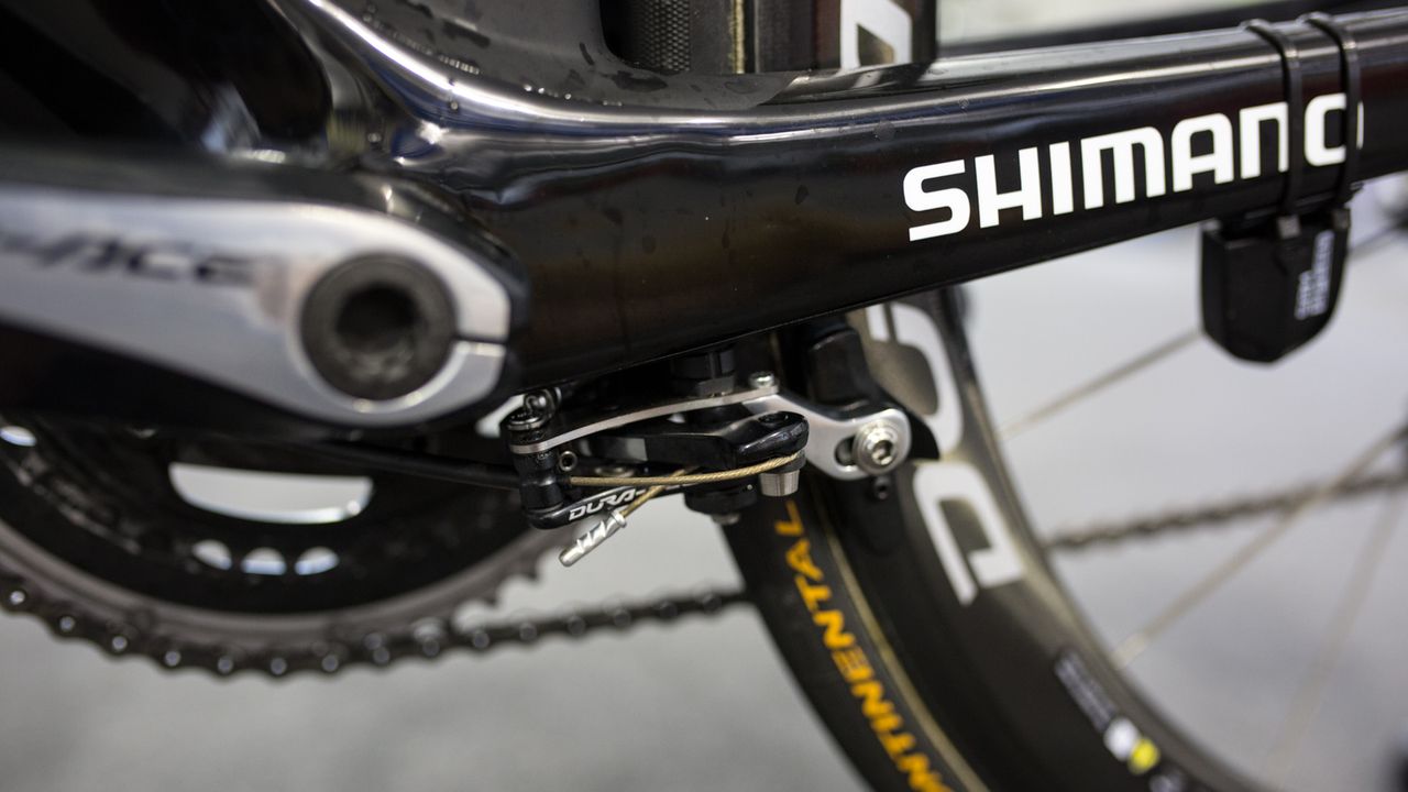 The rear brake is located underneath the bottom bracket