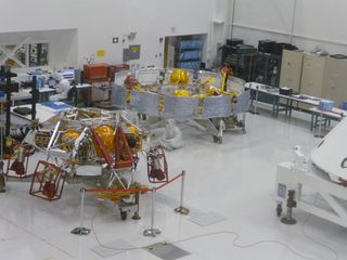 A close-up of the Mars Science Laboratory mission's entry-descent-landing system (foreground) and cruise stage, in a clean room at NASA's Jet Propulsion Laboratory in May 2011.