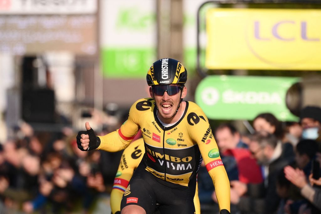 JumboVismas French rider Christophe Laporte celebrates as he crosses the finish line to win the 1st stage of the 80th Paris Nice cycling race 160 km between ManteslaVille and ManteslaVille on March 6 2022 Photo by FRANCK FIFE AFP Photo by FRANCK FIFEAFP via Getty Images