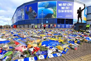 A view of flowers and scarves placed outside Cardiff City Stadium in tribute to Emiliano Sala