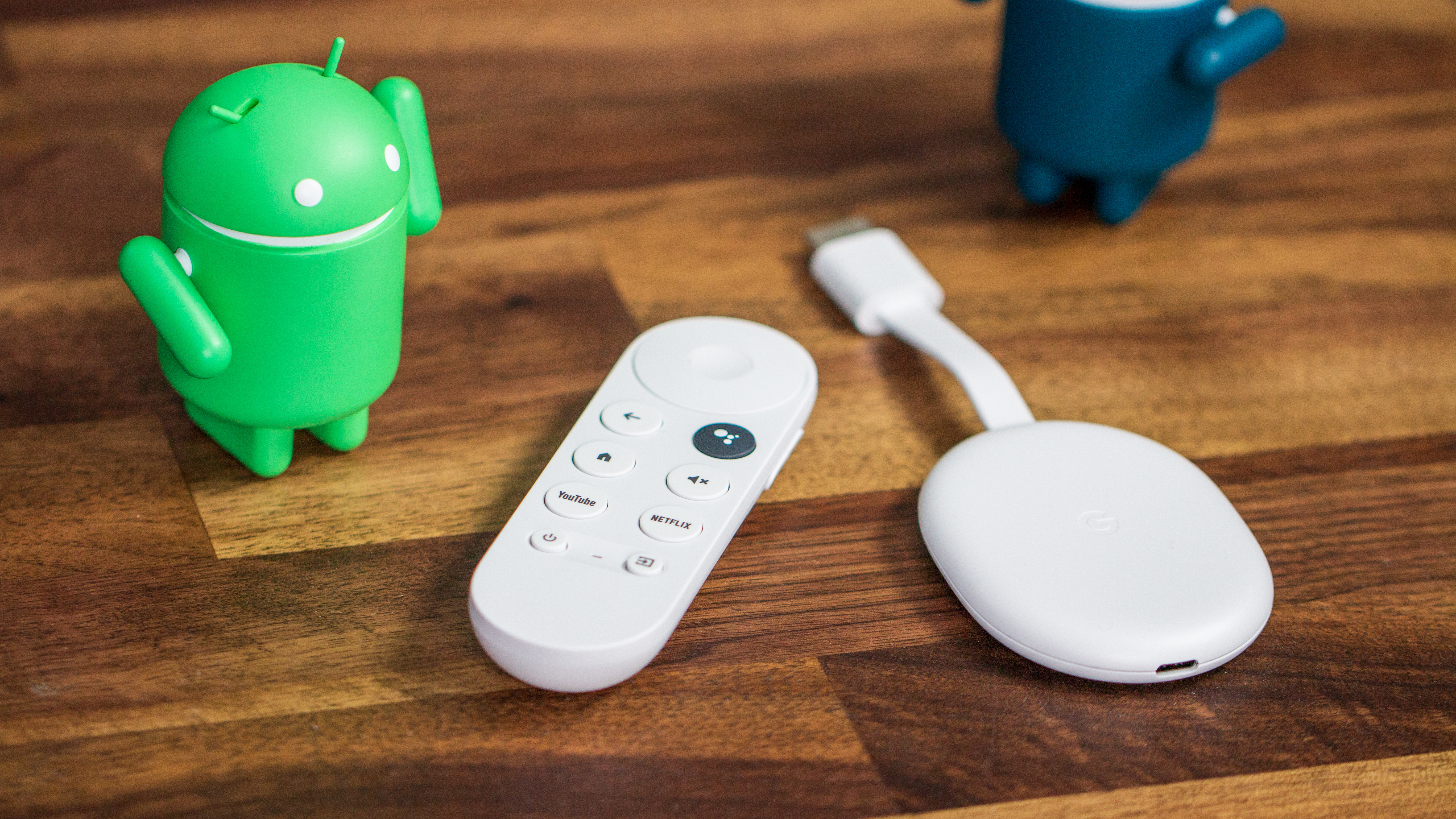 Chromecast with Google TV HD with Android figures on table