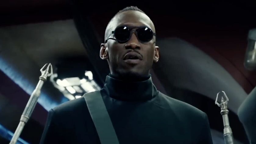 Mahershala Ali in dark shades and black outfit as he appears in Alita: Battle Angel.