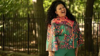 Michelle Buteau as Mavis smiling outside in Survival of the Thickest