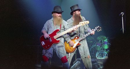 ZZ Top's Dusty Hill [left] and Billy Gibbons get their work clothes on as they perform live in 1981.