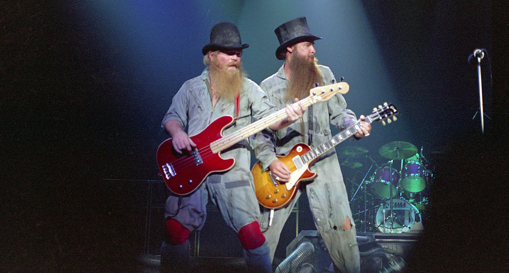 ZZ Top's Dusty Hill [left] and Billy Gibbons get their work clothes on as they perform live in 1981.