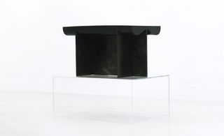 Side table cast in black beracryl resin