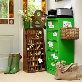 cabinet for storage with flower vase and shoes