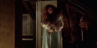 Margaret White (Piper Laurie) hugs Carrie (Sissy Spacek) in Carrie
