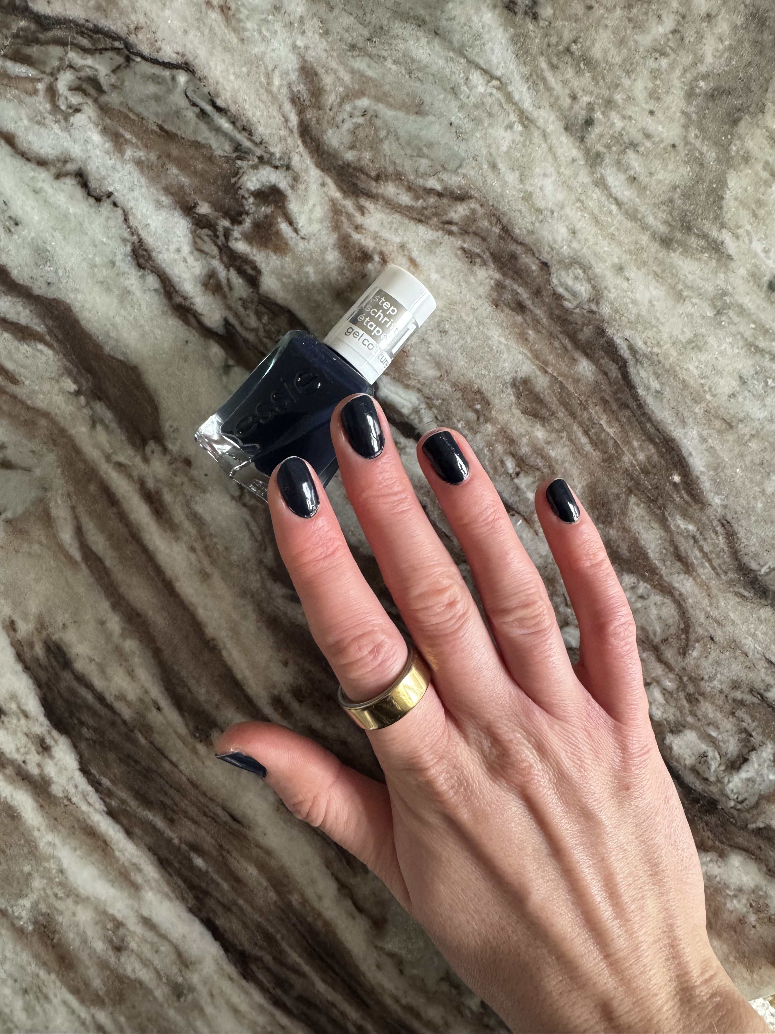 Eleanor wearing Essie Gel Couture Nail Polish in Caviar Bar