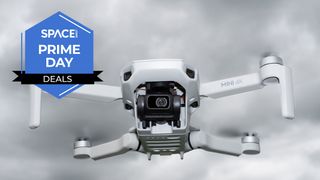 A DJI Mini 4K drone in flight, with a Space Prime Day deals badge over it. 