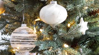 picture of Christmas tree with lights and baubles