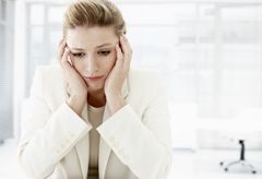 Woman at work, woman worried, woman streesed at work, woman stressed, upset woman