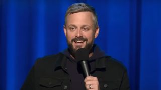 Nate Bargatze performing stand-up in The Greatest Average American