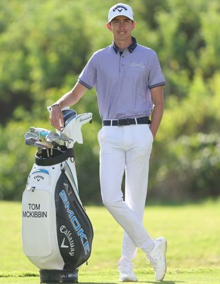 Tom McKibbin poses with his Callaway golf bag