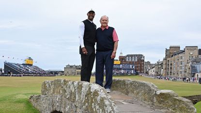 Tiger Woods and Jack Nicklaus pose on the Swilcan Bridge