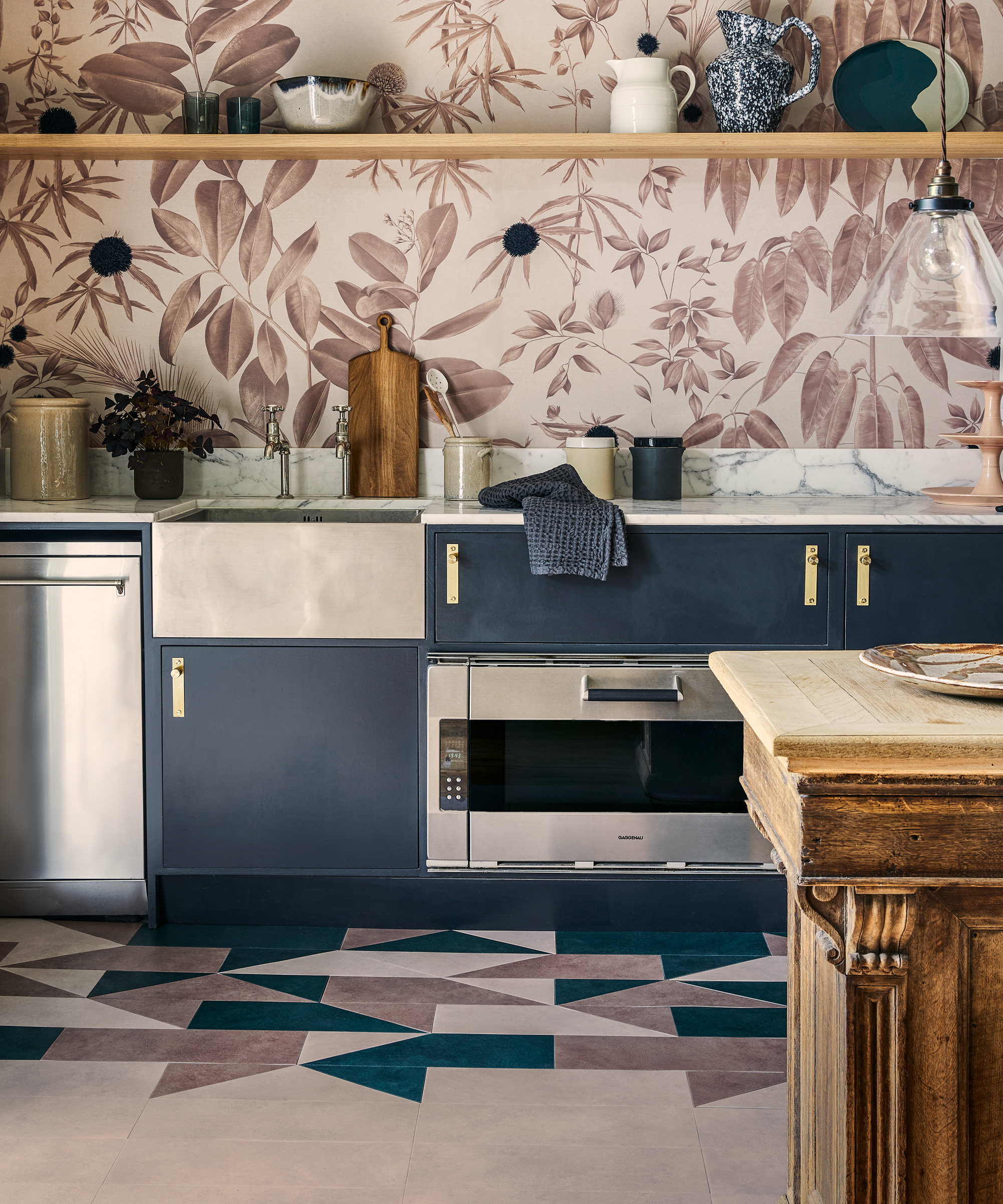 A kitchen with demonstrating colorful kitchen floor tile ideas with multicoloured triangular tiles