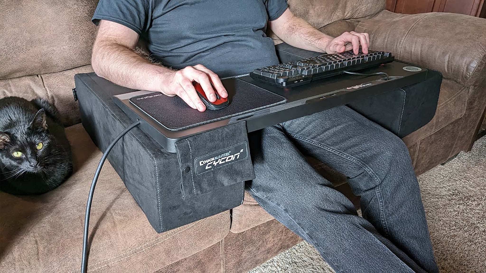 This lap desk with 6 USB ports made our couch my favorite PC gaming spot with a keyboard and mouse