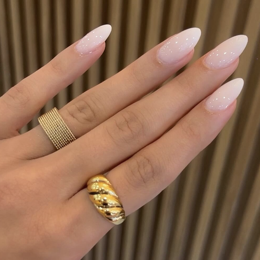 A milky white ombre manicure