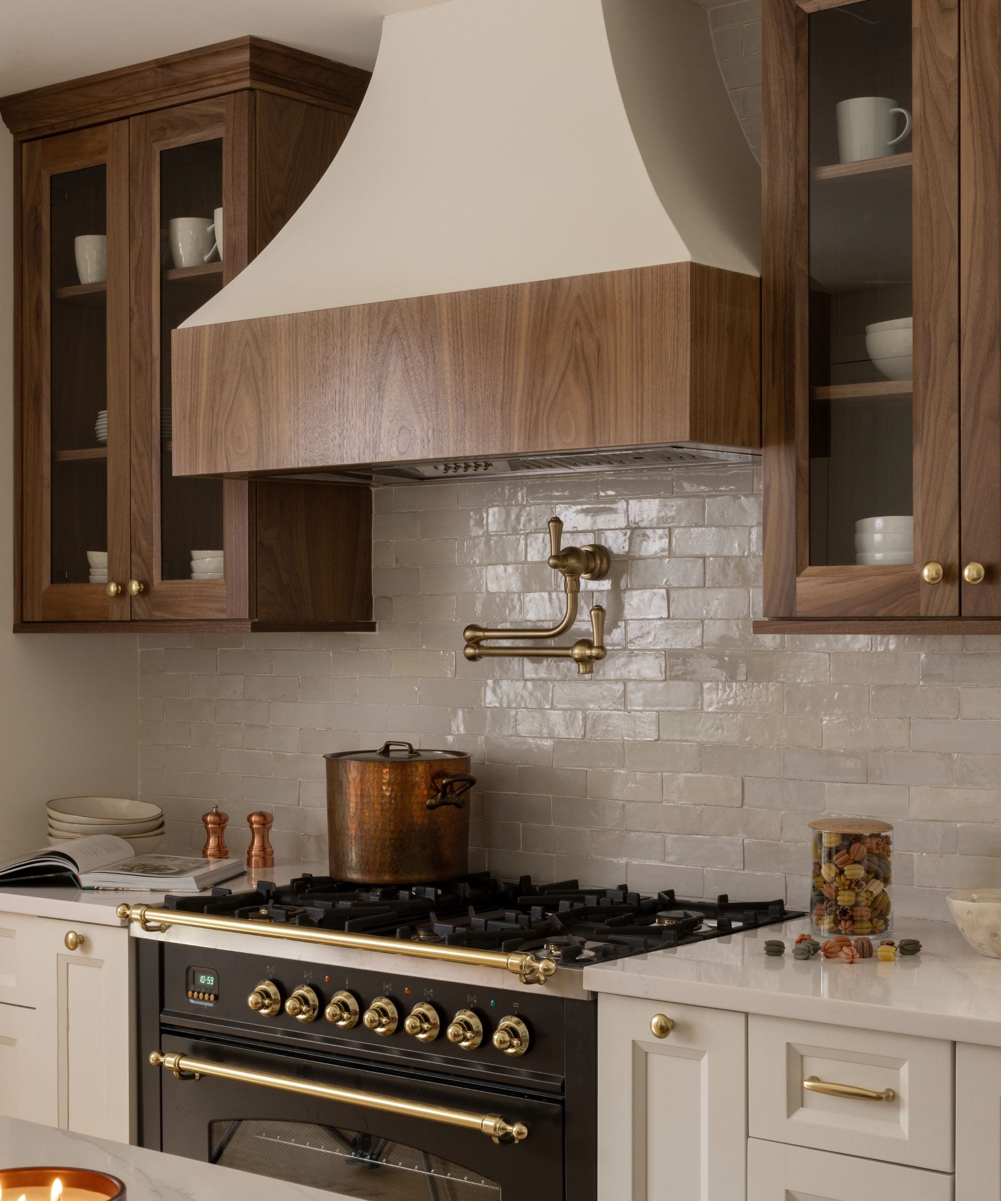 A white and wood kitchen with a zellige tile backsplash
