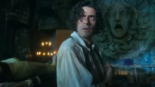 Oscar Isaac looking worried in Frankenstein.