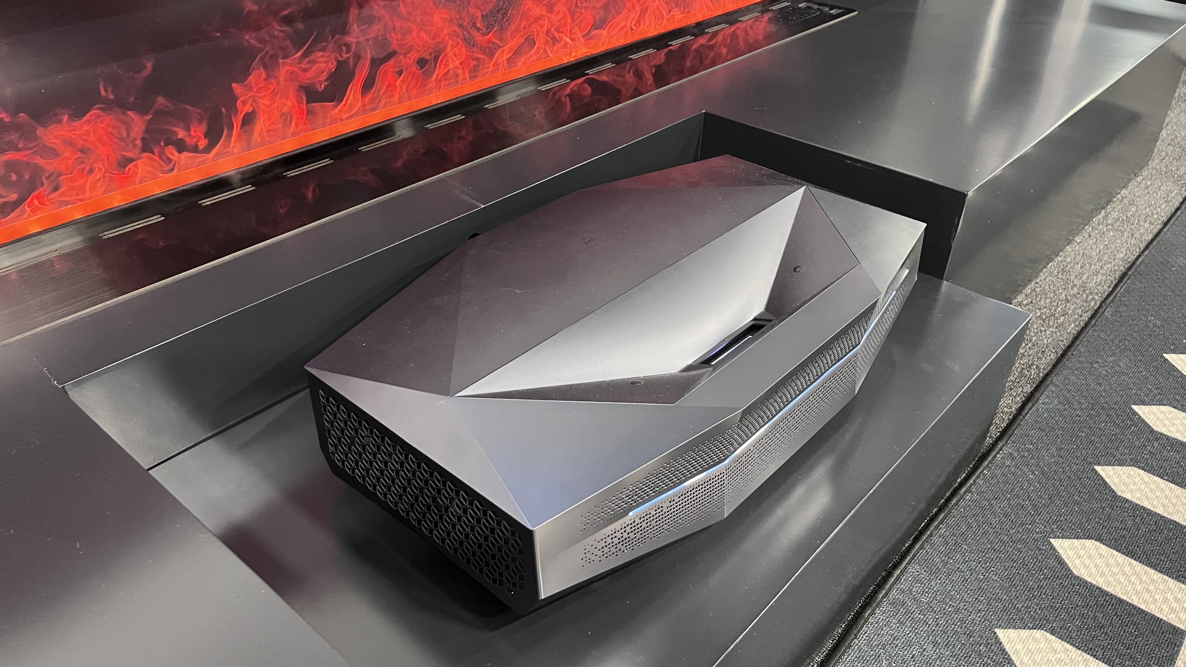 AWOL Vision Aetherion Max on table with fake fireplace in background