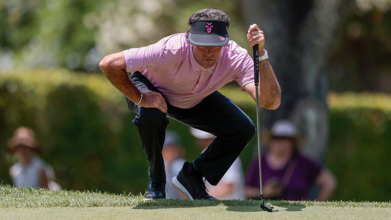 Bubba Watson lines-up a putt