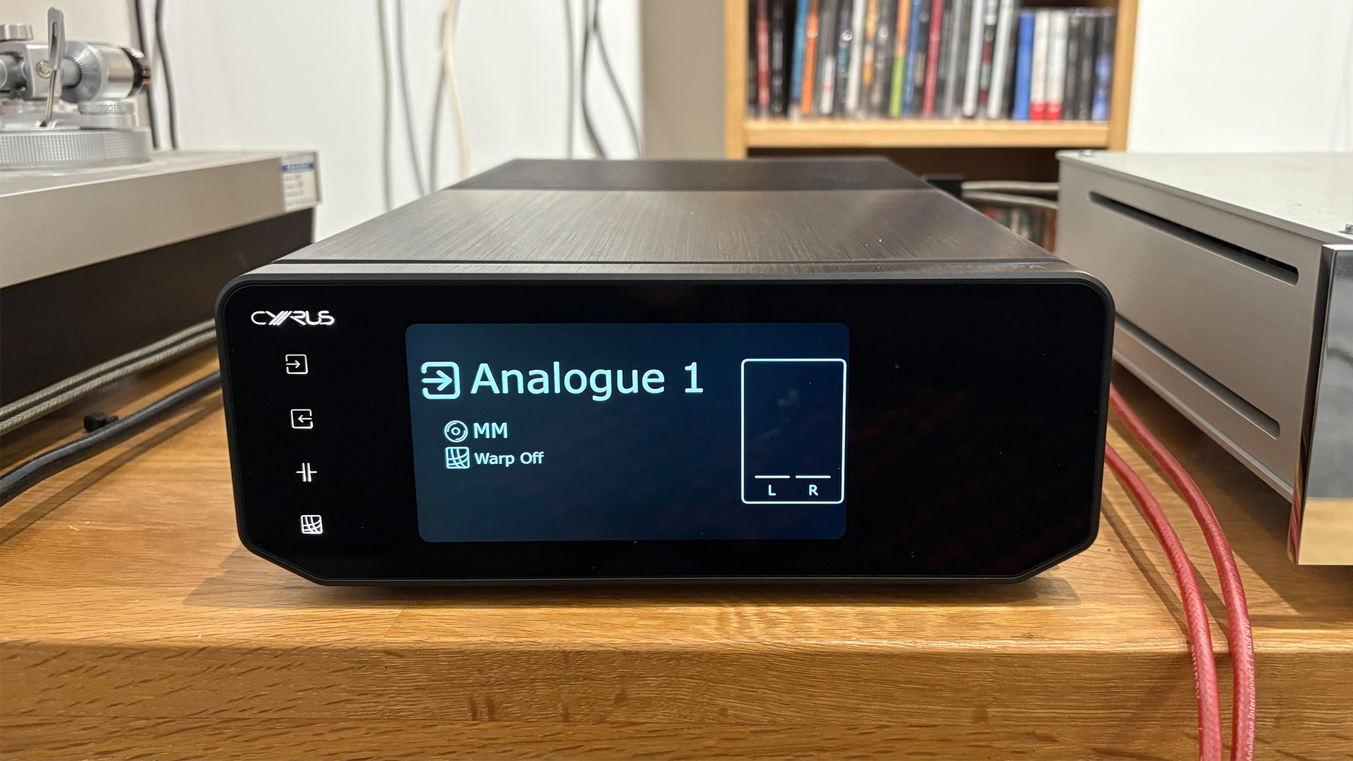 Cyrus 40 PPA phono stage on wooden hi-fi rack, on display is Analogue 1