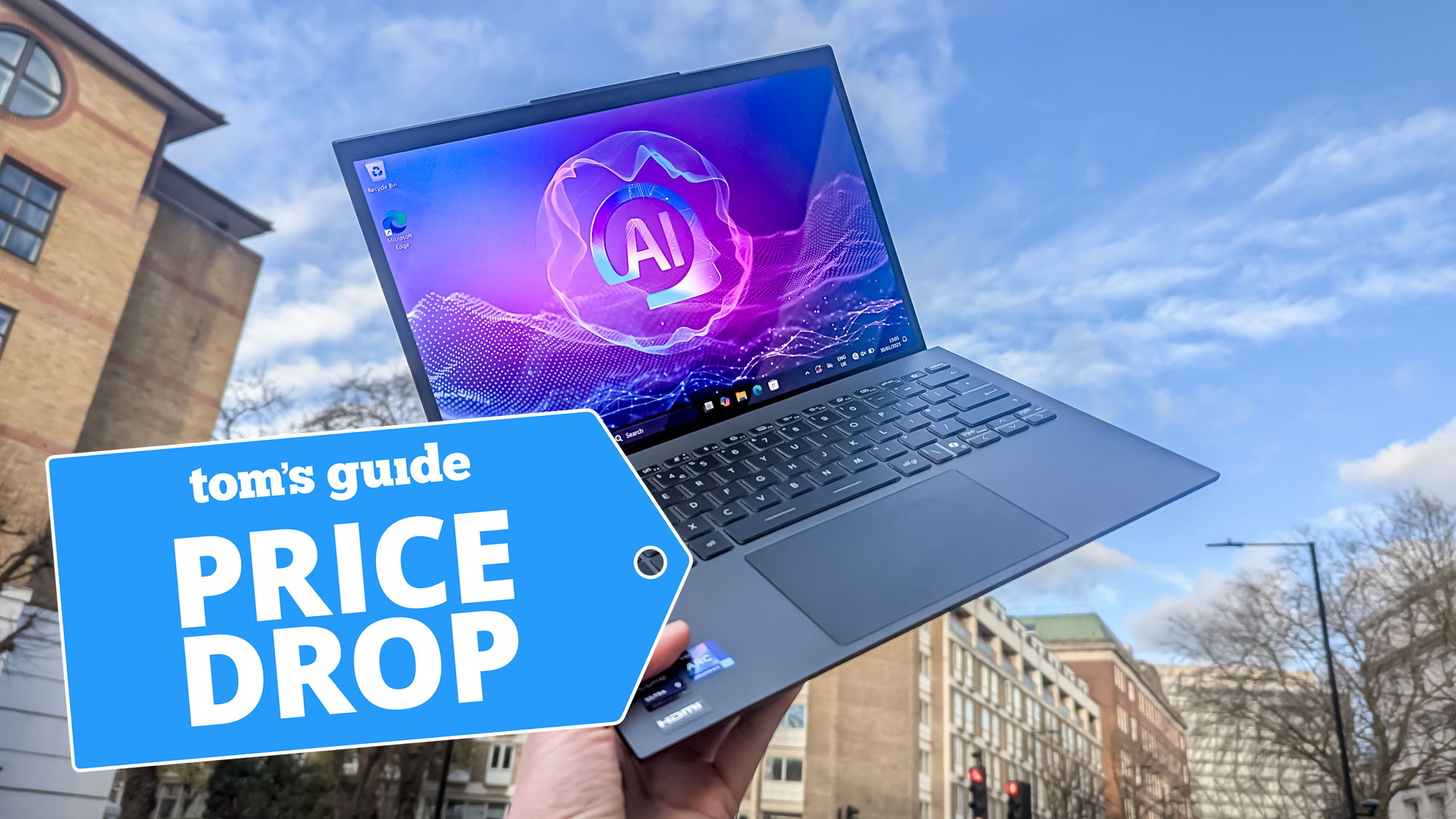MSI Prestige laptop held in air