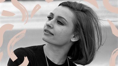 The Italian Actress Raffaella Carra with an italian bob haircut on a windswept beach