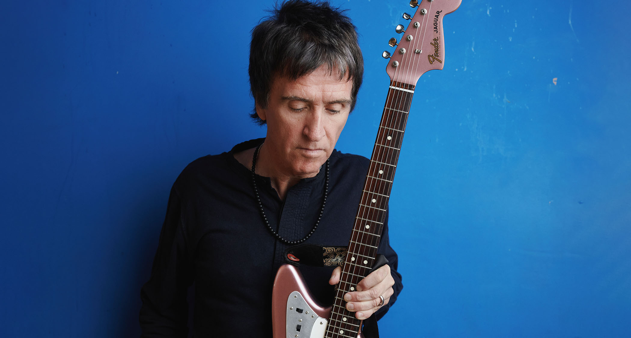 Johnny Marr pictured with one of his many Fender Jaguars.