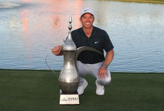 Paul Casey With The Trophy At The Dubai Desert Classic