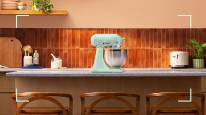 retro kitchen with brown vertical wall tiles and caramel painted walls with a stand mixer on the counter in the new KitchenAid Colour of the Year 2026 Spearmint