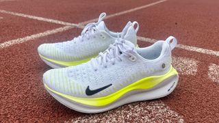 Nike Infinity Run 4 running shoe on a running track