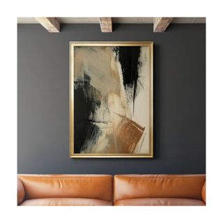 brown, gold and black abstract art on grey wall above leather sofa