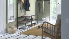 IKEA NIP&Aring;SEN 3-in-1 shoe-storage-coat-rack-bench combo styled inside of a moss green sunlit entryway with black-and-white tiled floors, a woven rug, and assorted household essentials
