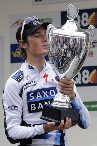 Andy Schleck on the podium with his Liège - Bastogne - Liège winner's trophy.