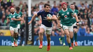 Antoine Dupont of France breaks to score a try during a Six Nations match against Ireland.