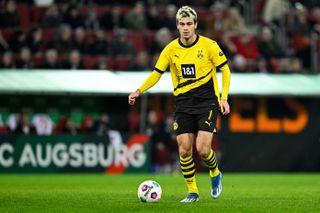 Gio Reyna in action for Borussia Dortmund against Augsburg in December 2023.