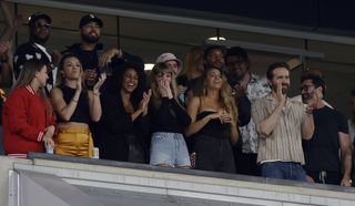 Taylor Swift attending chiefs games in chiefs color outfits