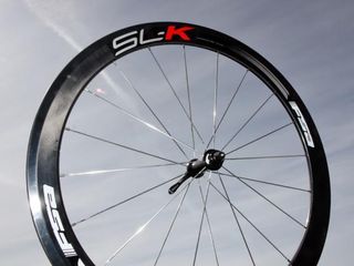 FSA add an SL-K model to their carbon tubular wheel range, using a higher glass fiber content to bring the price down relative to the K-Force flagship. Hubs are machined in-house.