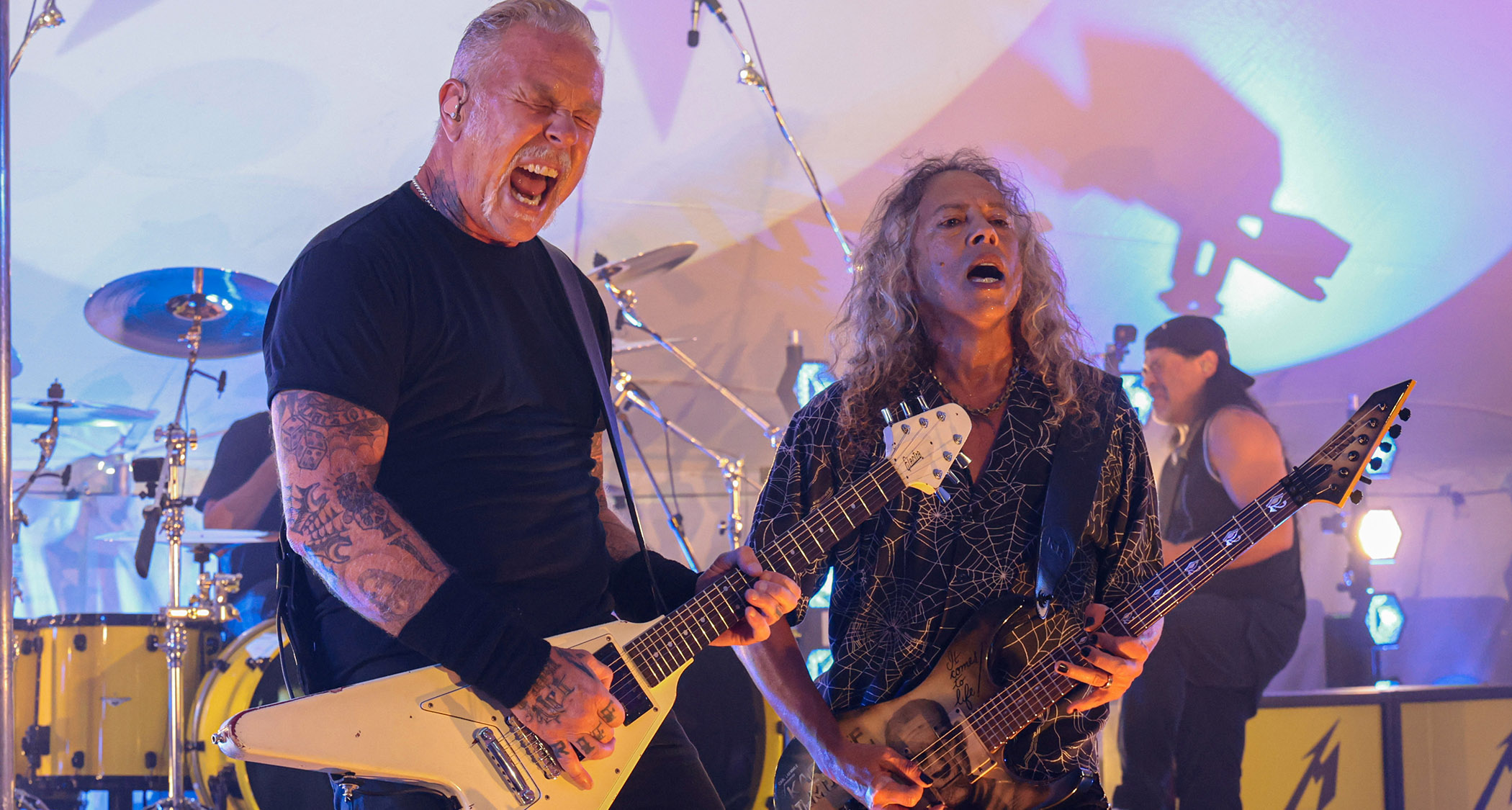 James Hetfield and Kirk Hammett perform live on SiriusXM, with Hetfield playing his white Flying V copy and Hammett playing his Mummy ESP signature model