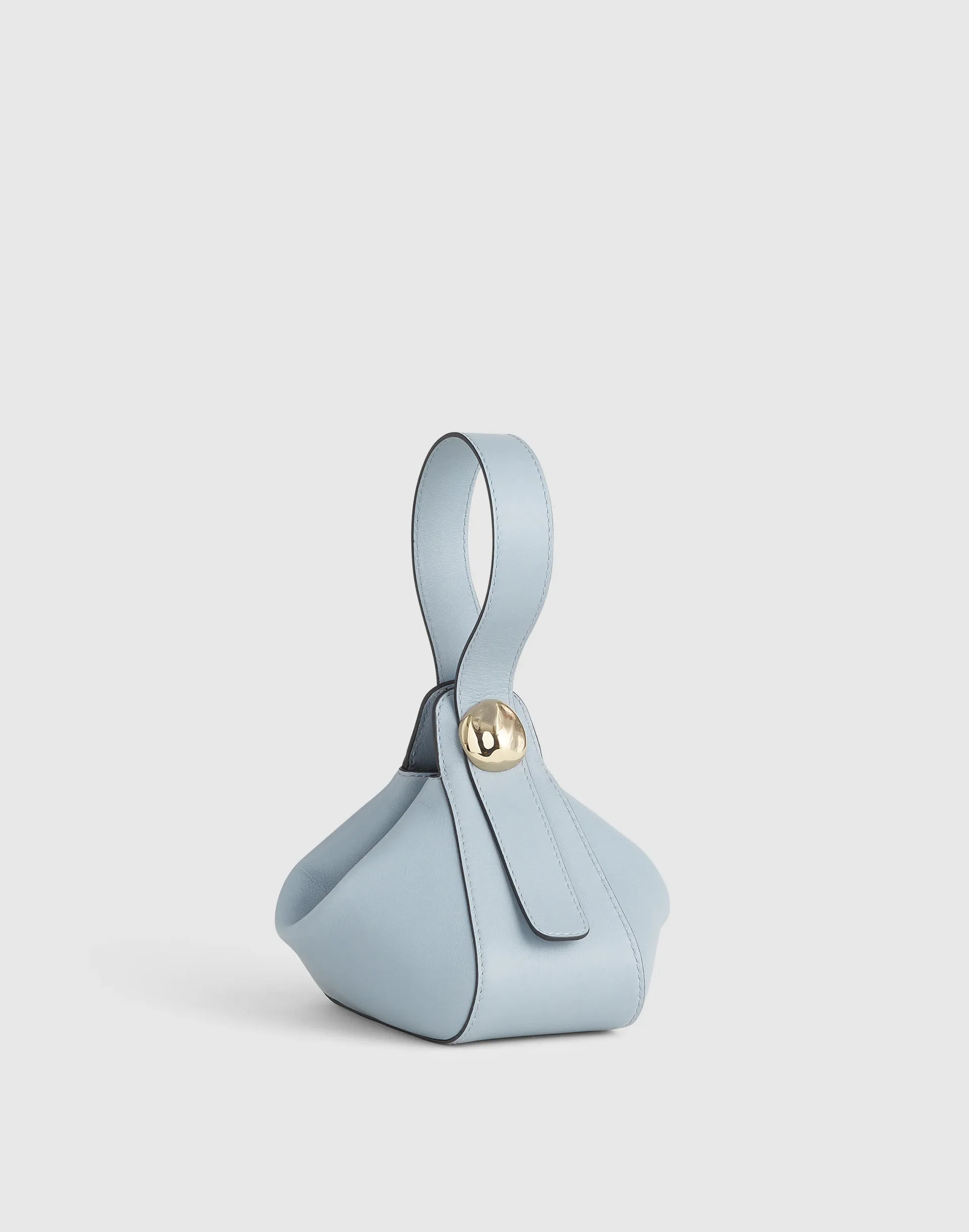 The Sculpted Metal Wristlet Bag
